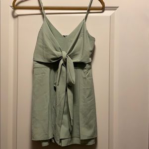 Teal bow romper